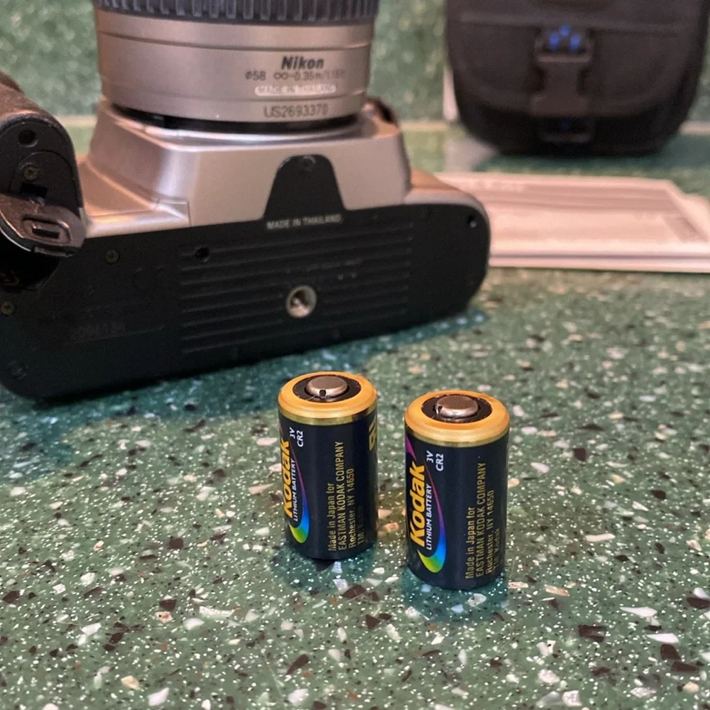 Nikon N55 with AF Zoom-Nikkor 28-80mm f/3.3-5.6G and 70-300mm f/4-5.6G